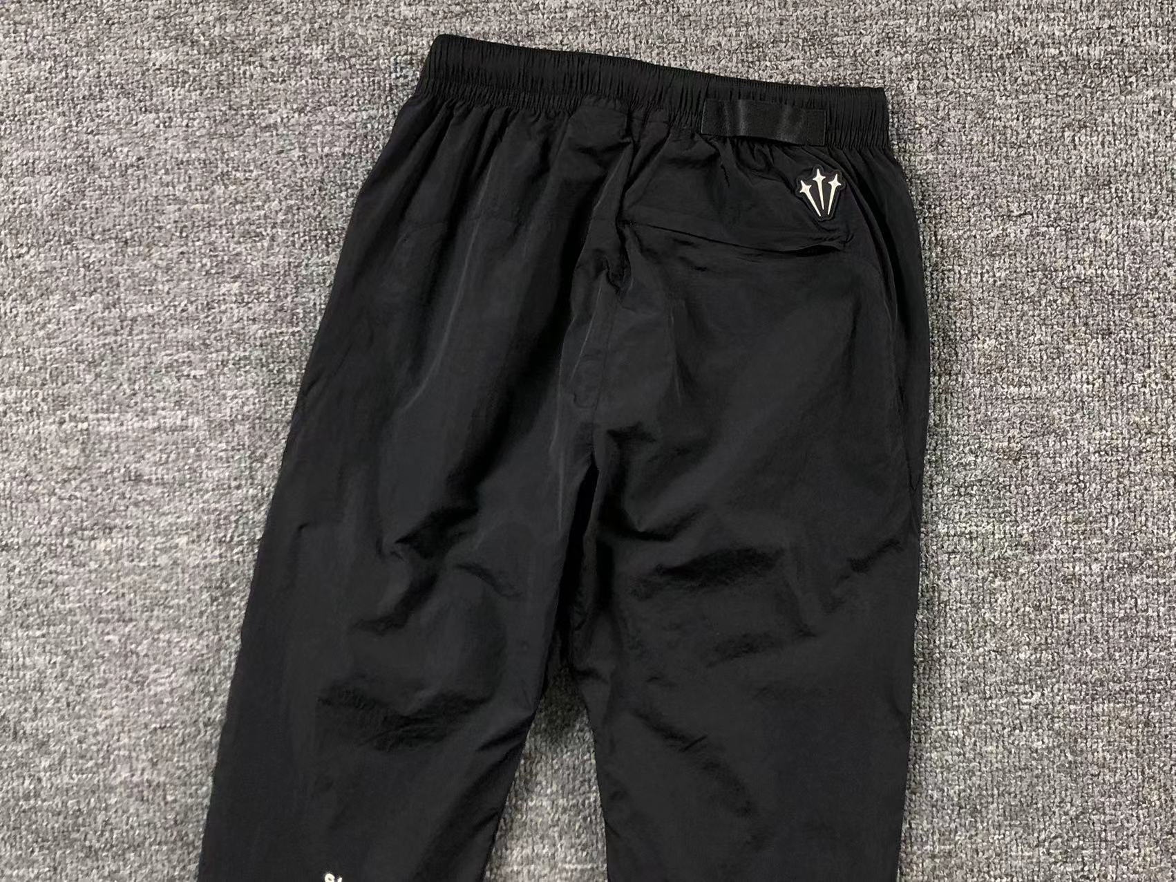 nike-x-drake-nocta-track-pants-black-6_cc88faad-Drip Store Argentina