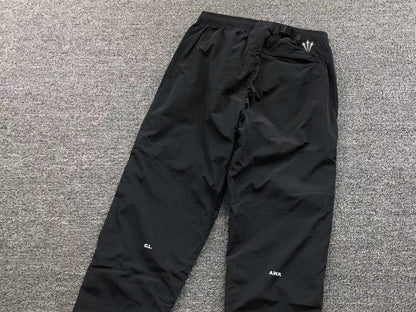nike-x-drake-nocta-track-pants-black-6_e37bab51-Drip Store Argentina