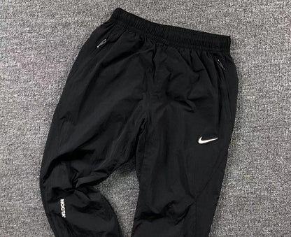 nike-x-drake-nocta-track-pants-black-7_f440e70f-Drip Store Argentina