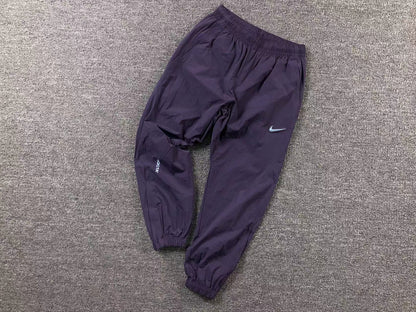 nike-x-drake-nocta-track-pants-dark-raisin-Drip Store Argentina