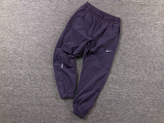 nike-x-drake-nocta-track-pants-dark-raisin-Drip Store Argentina