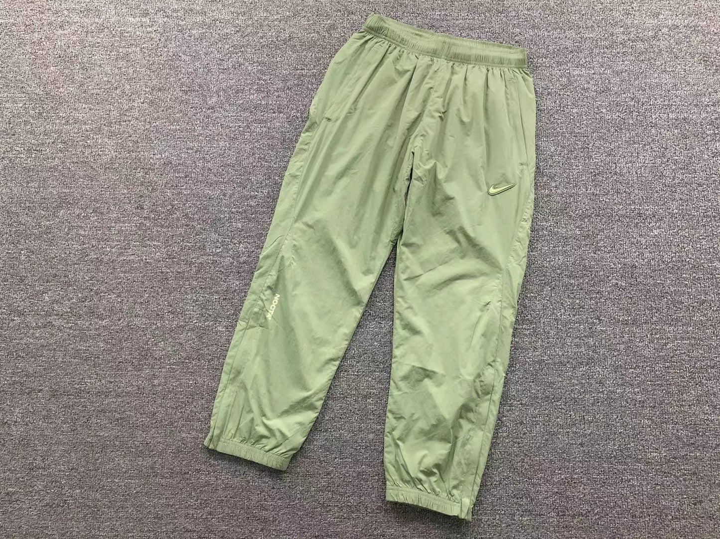 nike-x-drake-nocta-track-pants-oil-green-Drip Store Argentina