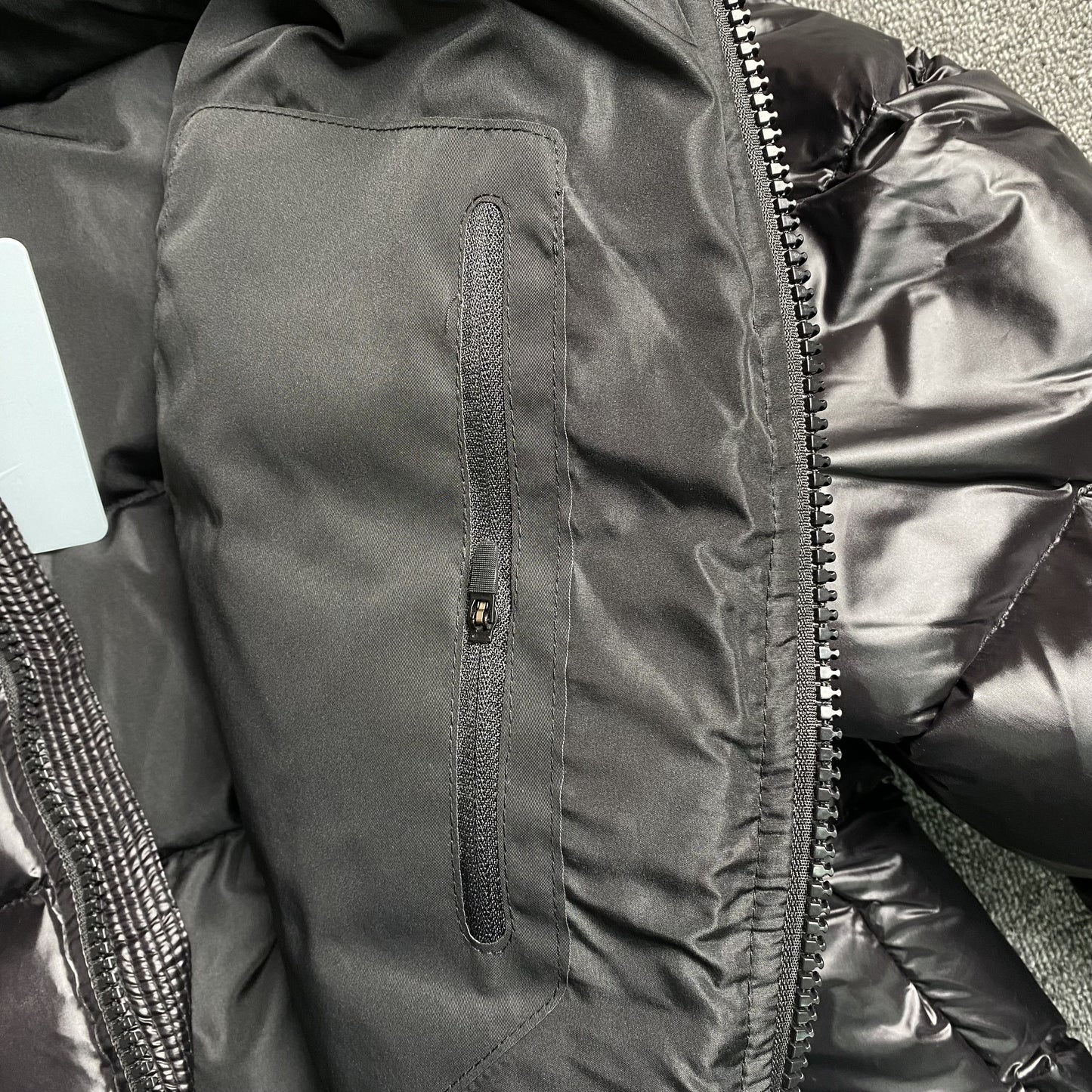 nike-x-nocta-sunset-puffer-jacket-black-12-Drip Store Argentina