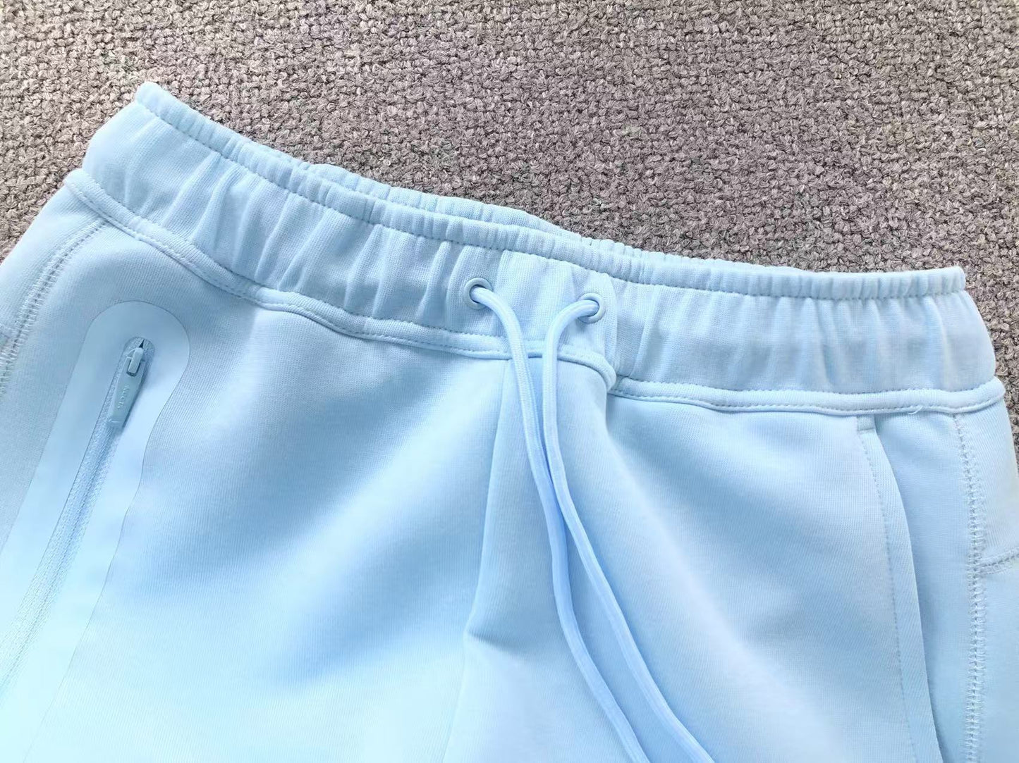 Pantalón Nike X Nocta Tech Fleece Celeste