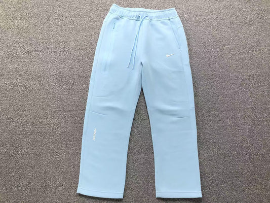 Pantalón Nike X Nocta Tech Fleece Celeste