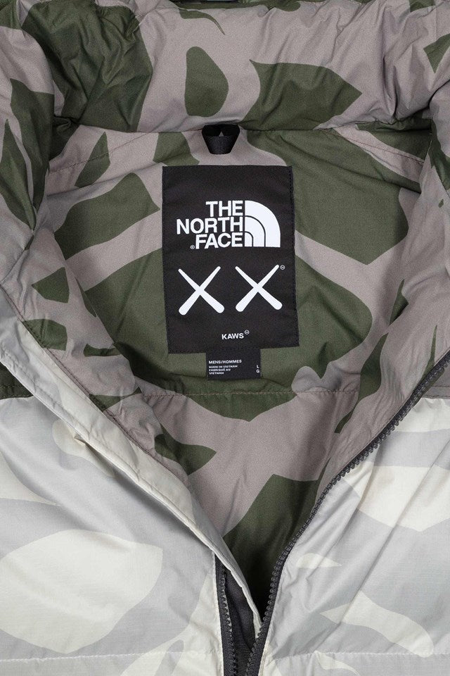 KAWS X THE NORTH FACE RETRO 1996 NUPTSE JACKET MOONLIGHT IVORY NUPTSE PRINT