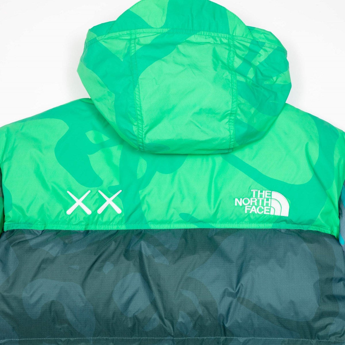 KAWS X THE NORTH FACE RETRO 1996 NUPTSE JACKET SAFETY GREEN NUPTSE PRINT