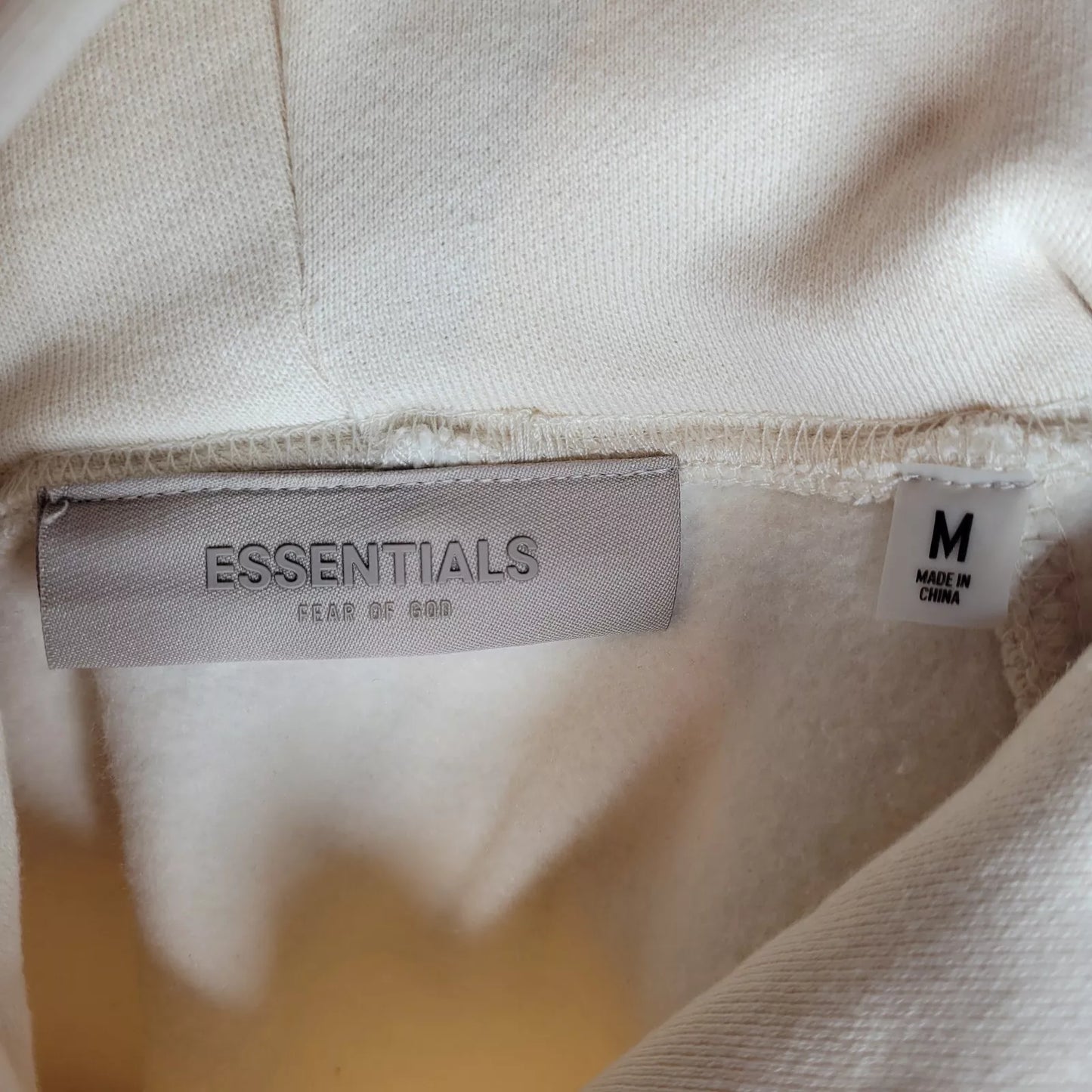 FEAR OF GOD ESSENTIALS HOODIE EGG SHELL