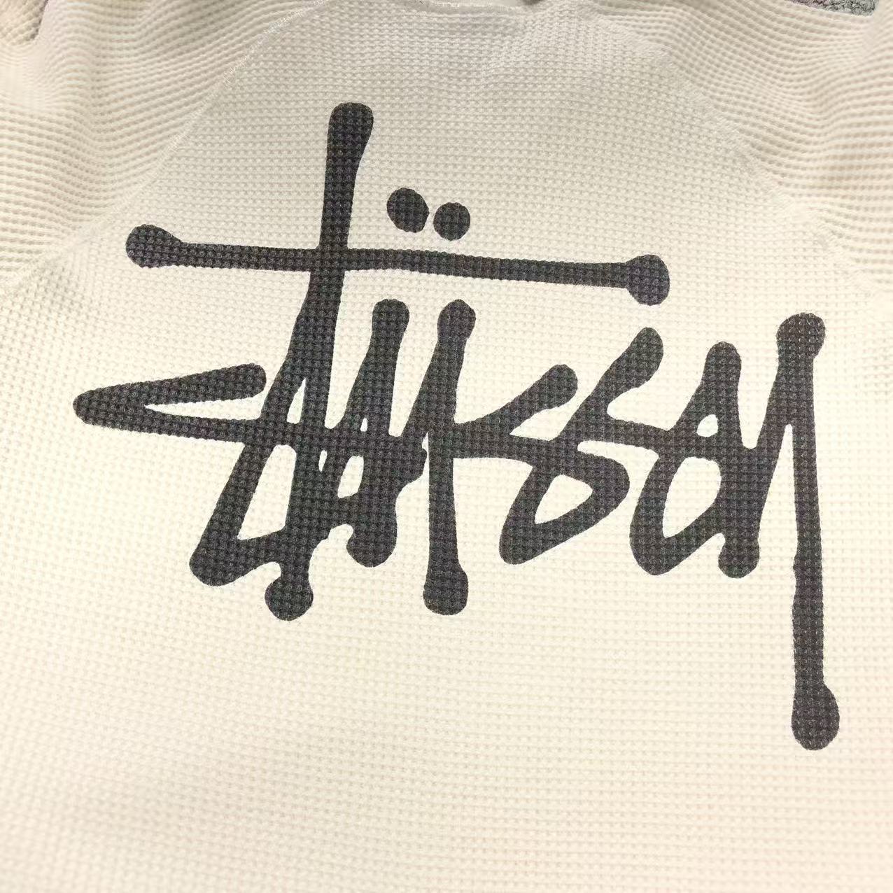 Remera Stussy Thermal Raglan Crema