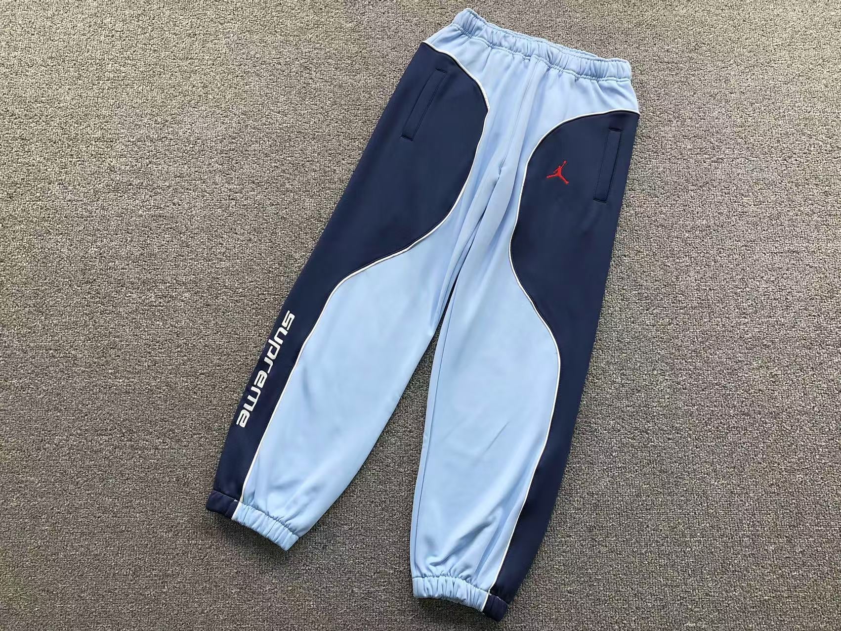 supreme-jordan-tricot-track-pants-light-blue-Drip Store Argentina