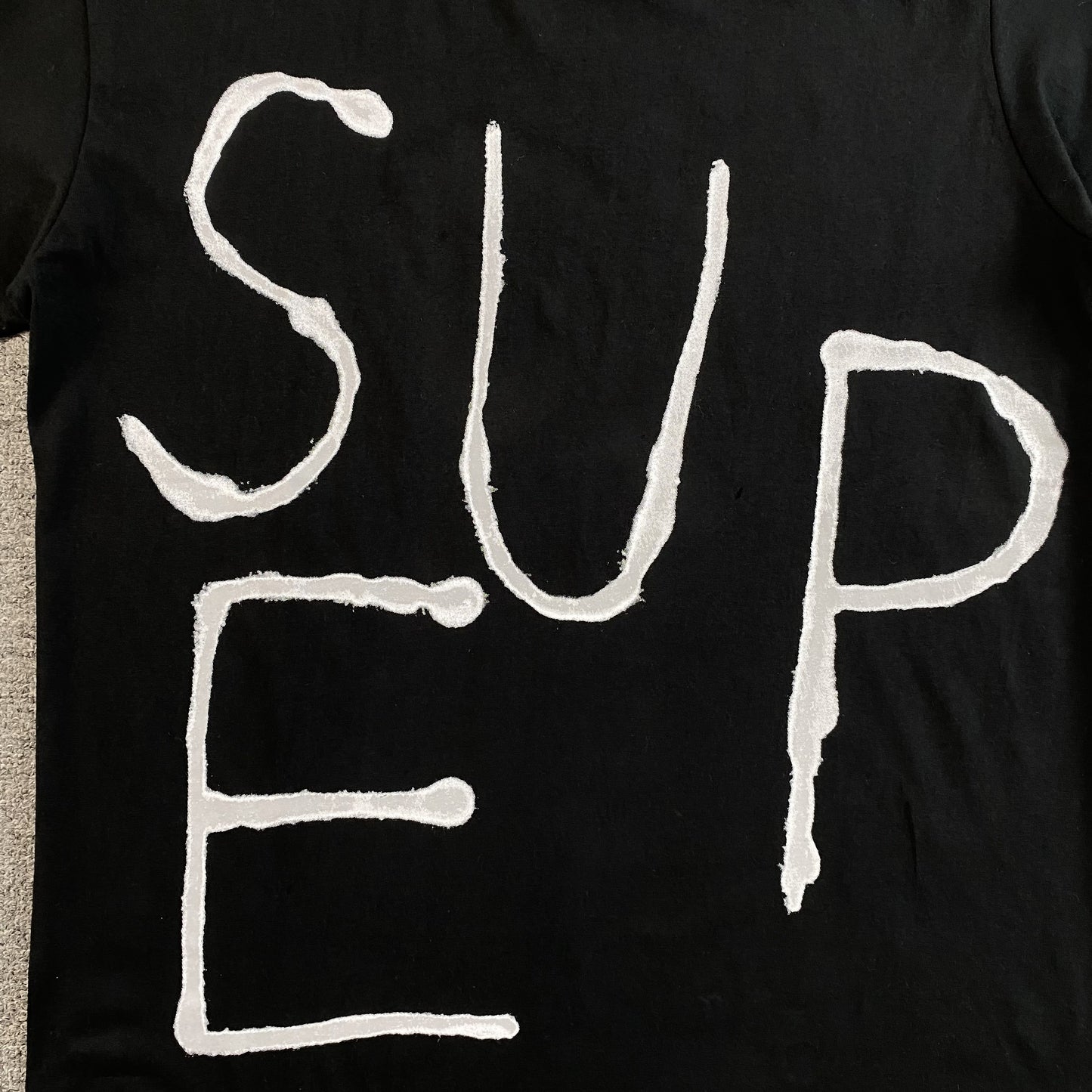Remera Supreme Painted Negra