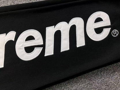 Pantalón Supreme Satin Appliqué Negro