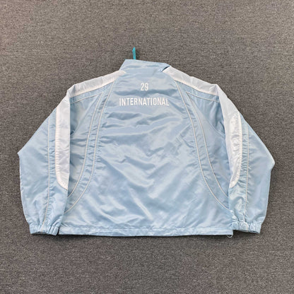 Campera Supreme Satin Piping Pullover Celeste