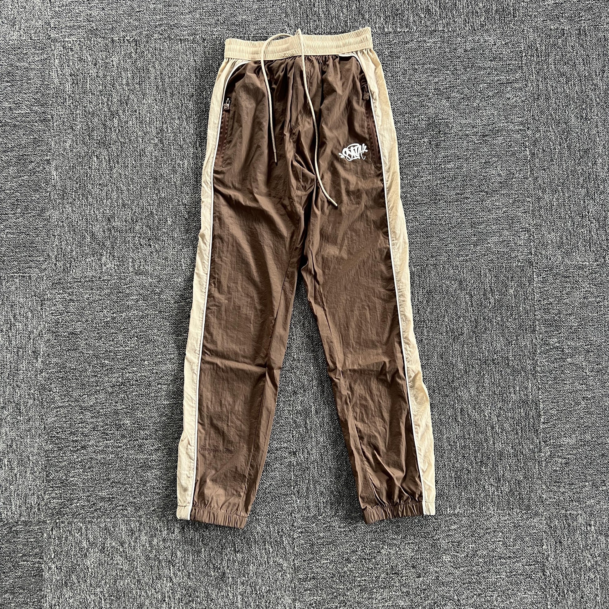 syna-world-syna-logo-shell-pants-brown-Drip Store Argentina