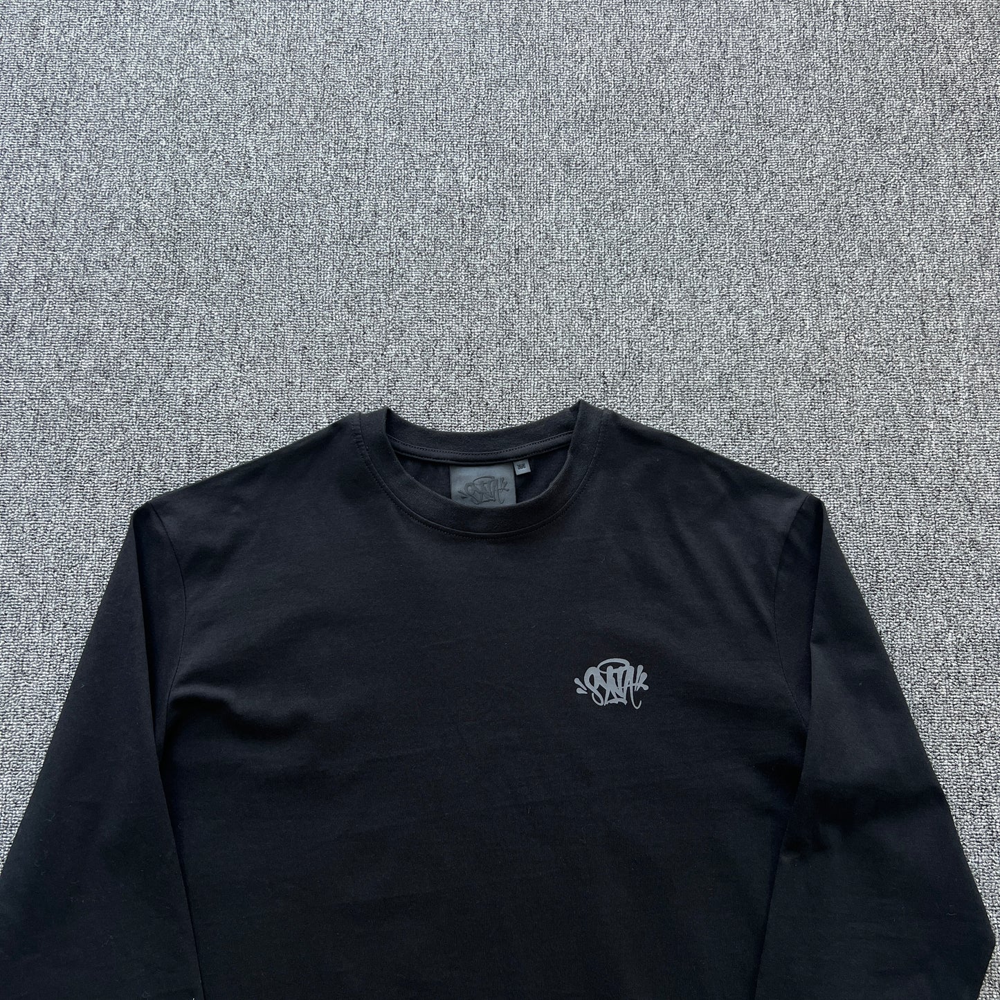 Remera Syna World Synarchy Negra