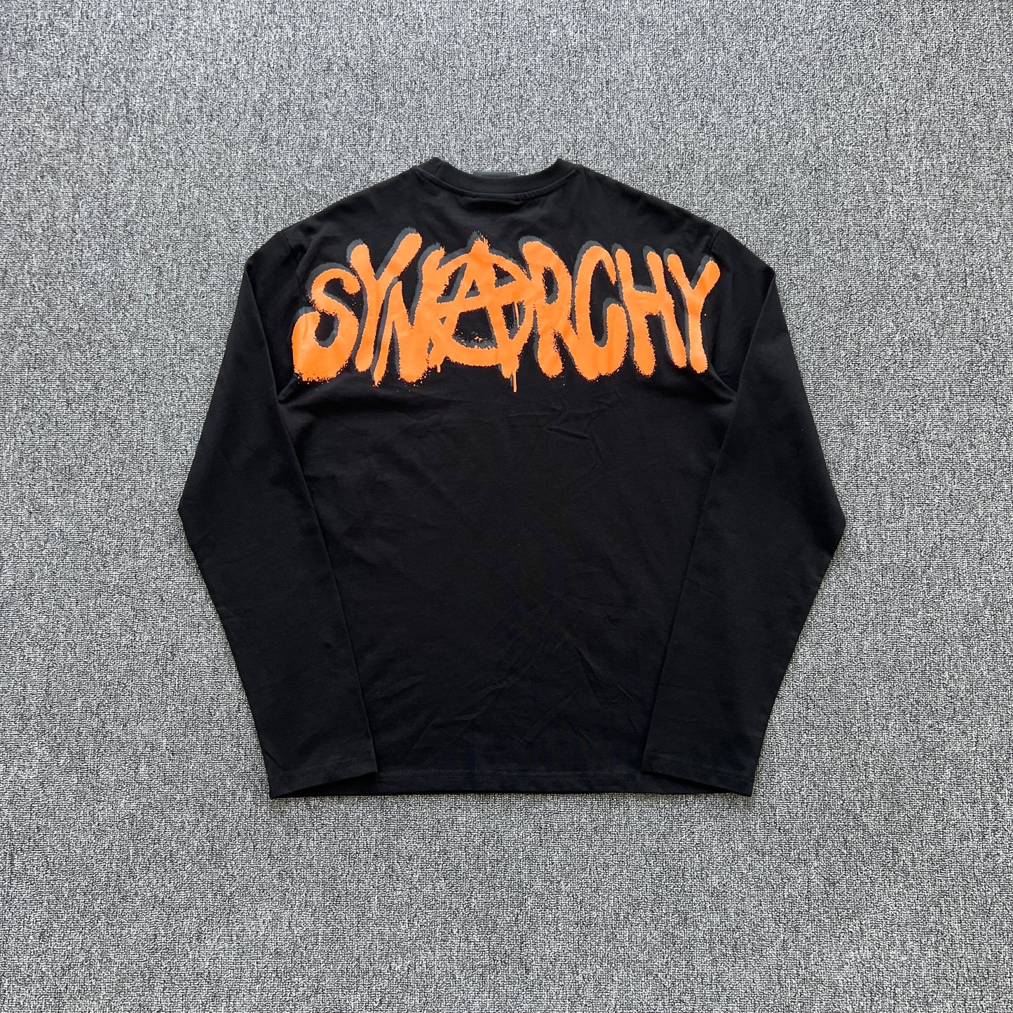 Remera Syna World Synarchy Negra Naranja