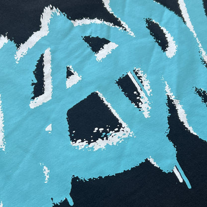 Remera Syna World Synarchy Negra Celeste