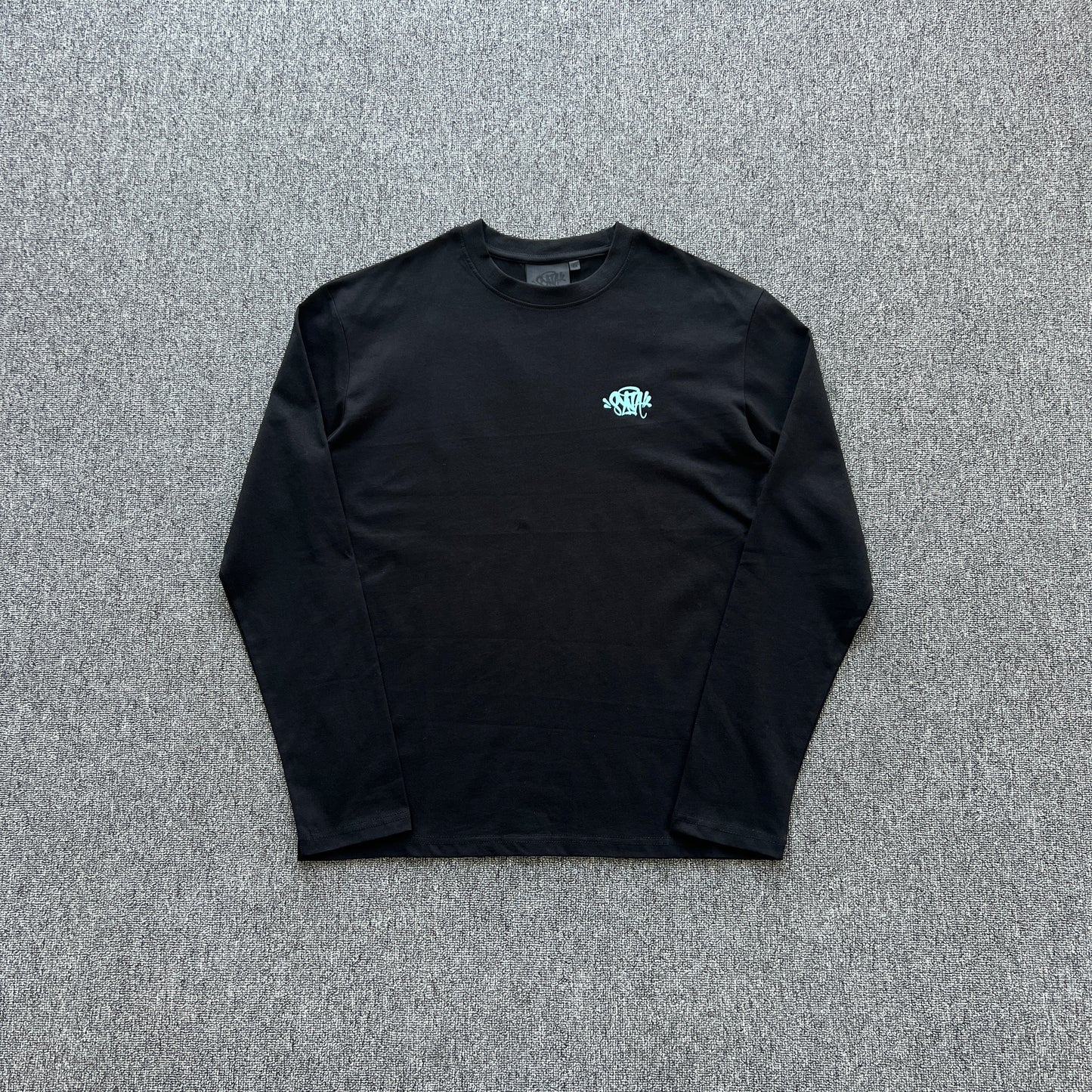 Remera Syna World Synarchy Negra Celeste