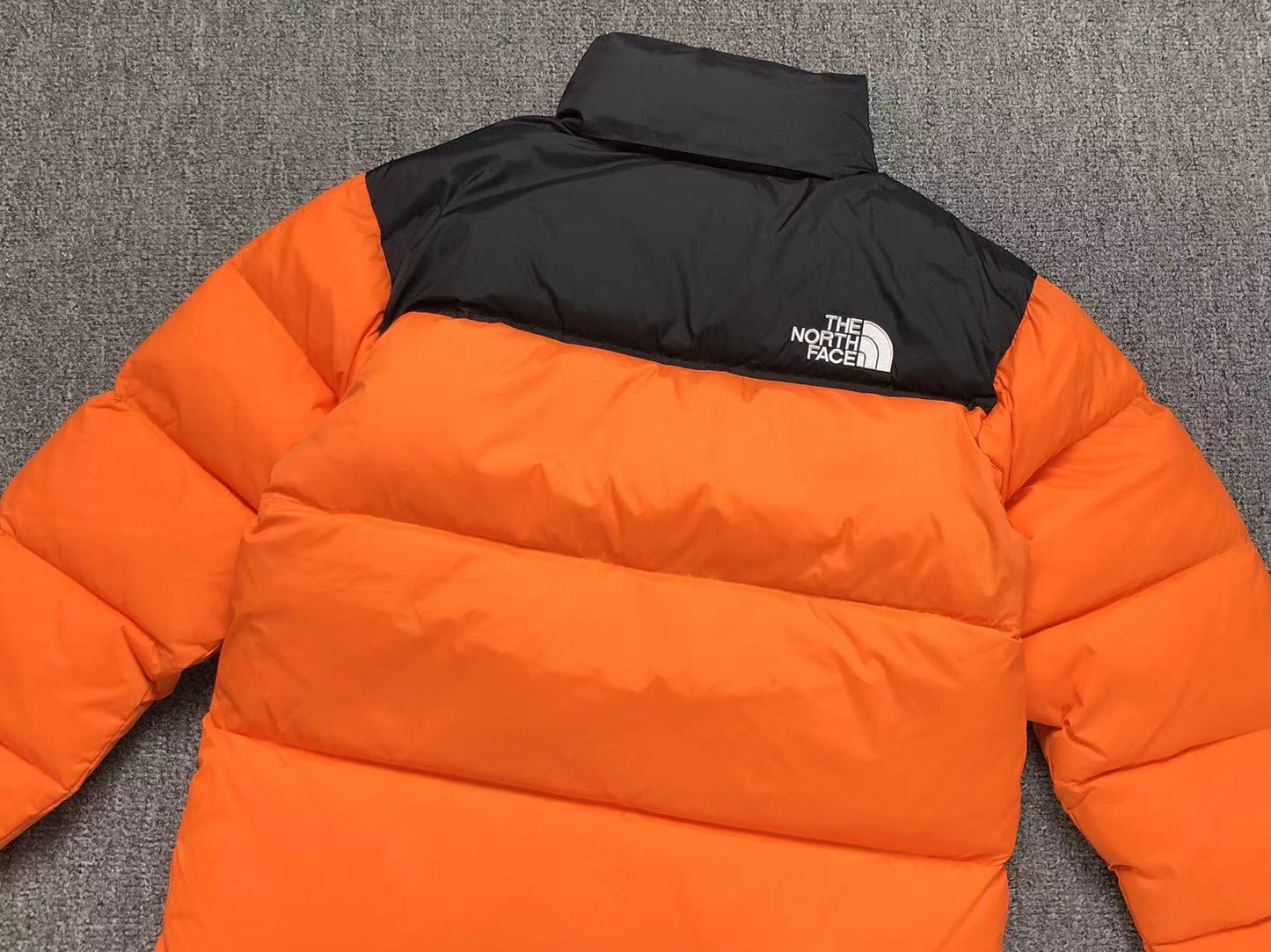 the-north-face-1996-retro-nuptse-700-fill-packable-jacket-orange-4-Drip Store Argentina