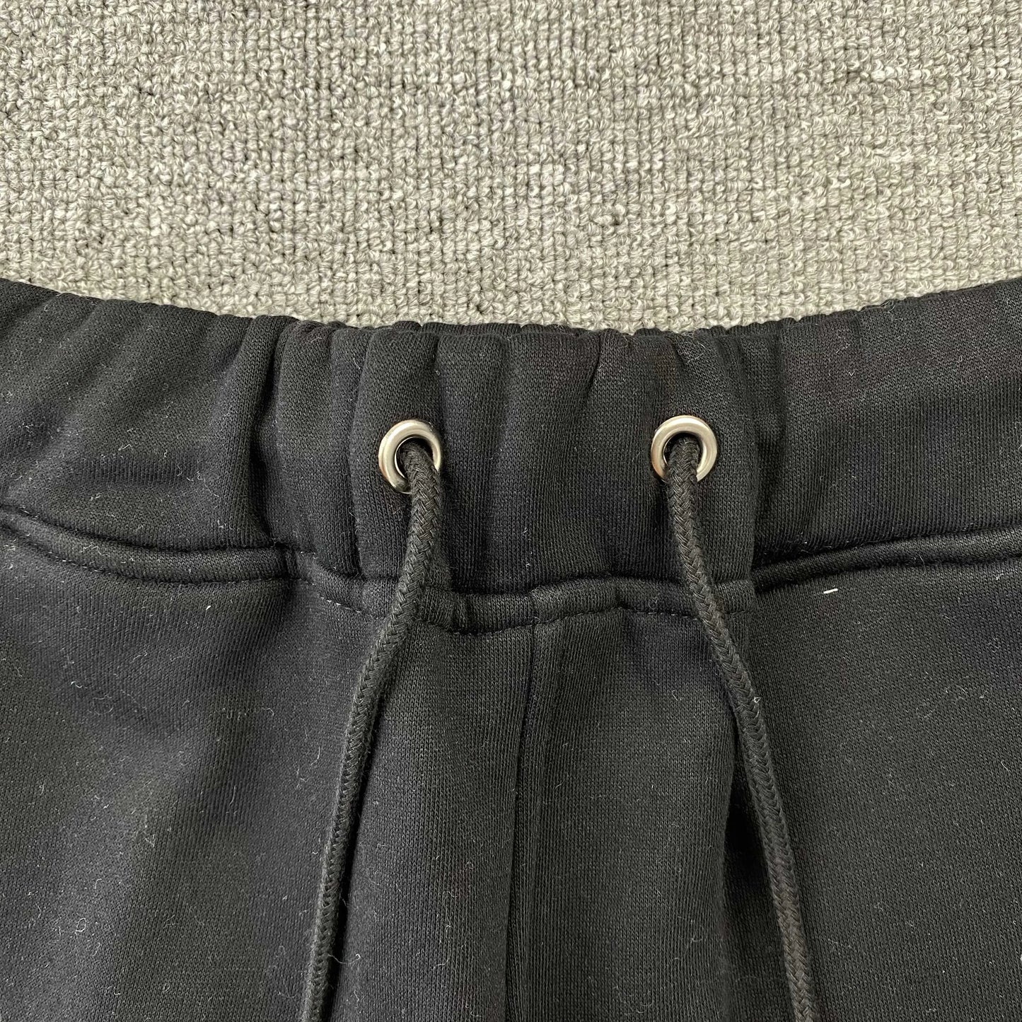 trapstar-chenille-decoded-tracksuit-black-orange-6-Drip Store Argentina