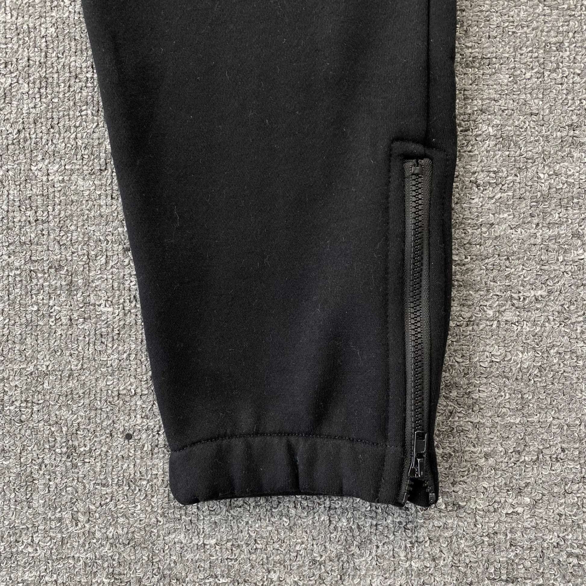 trapstar-chenille-decoded-tracksuit-black-orange-7-Drip Store Argentina