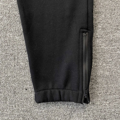 trapstar-chenille-decoded-tracksuit-black-orange-7-Drip Store Argentina