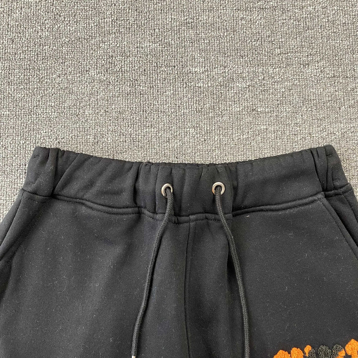 trapstar-chenille-decoded-tracksuit-black-orange-8-Drip Store Argentina