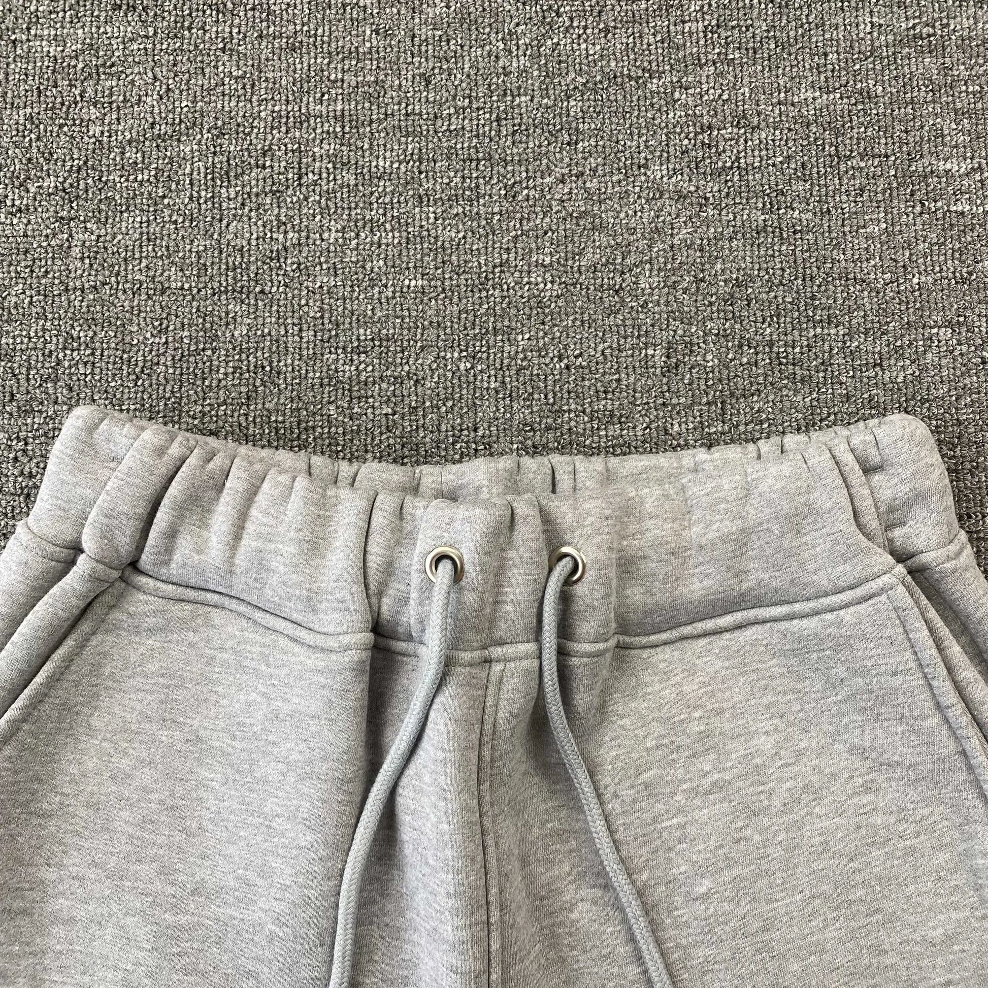 trapstar-chenille-decoded-tracksuit-grey-orange-13-Drip Store Argentina