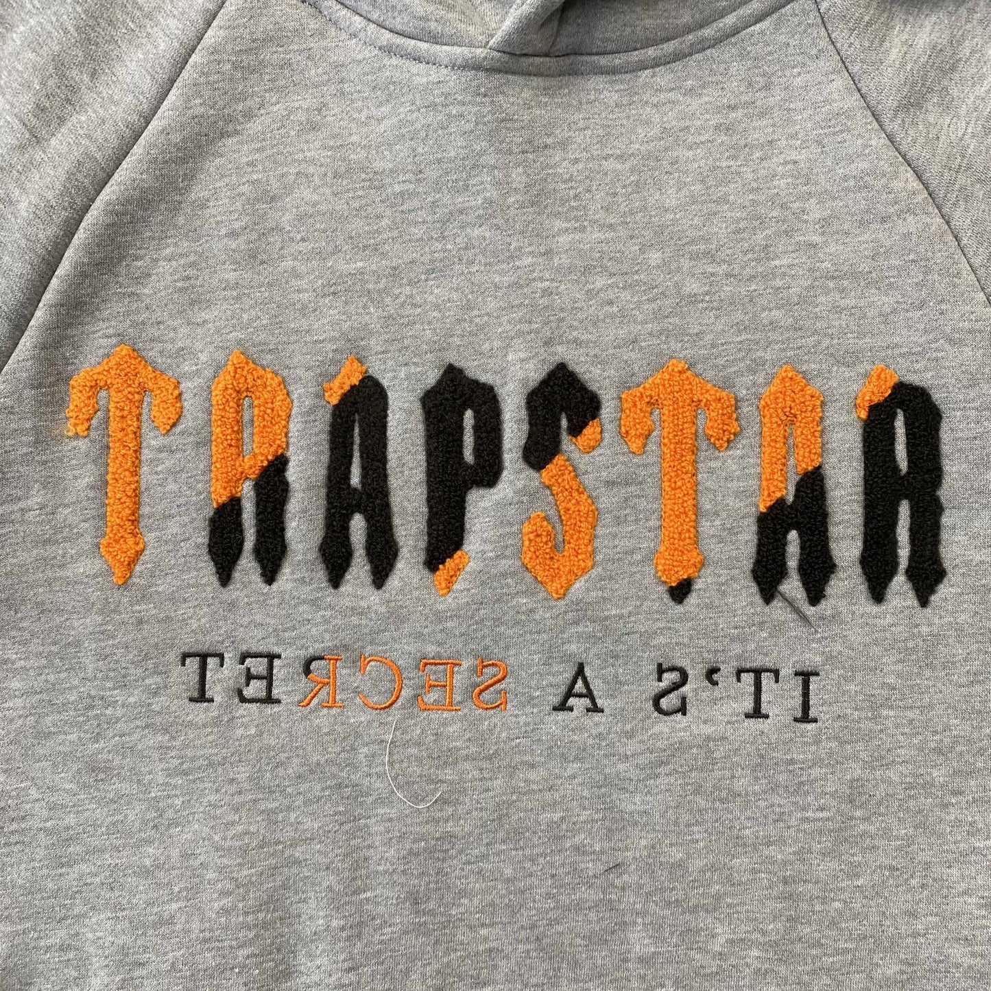 trapstar-chenille-decoded-tracksuit-grey-orange-2-Drip Store Argentina