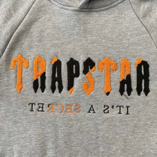 trapstar-chenille-decoded-tracksuit-grey-orange-2-Drip Store Argentina