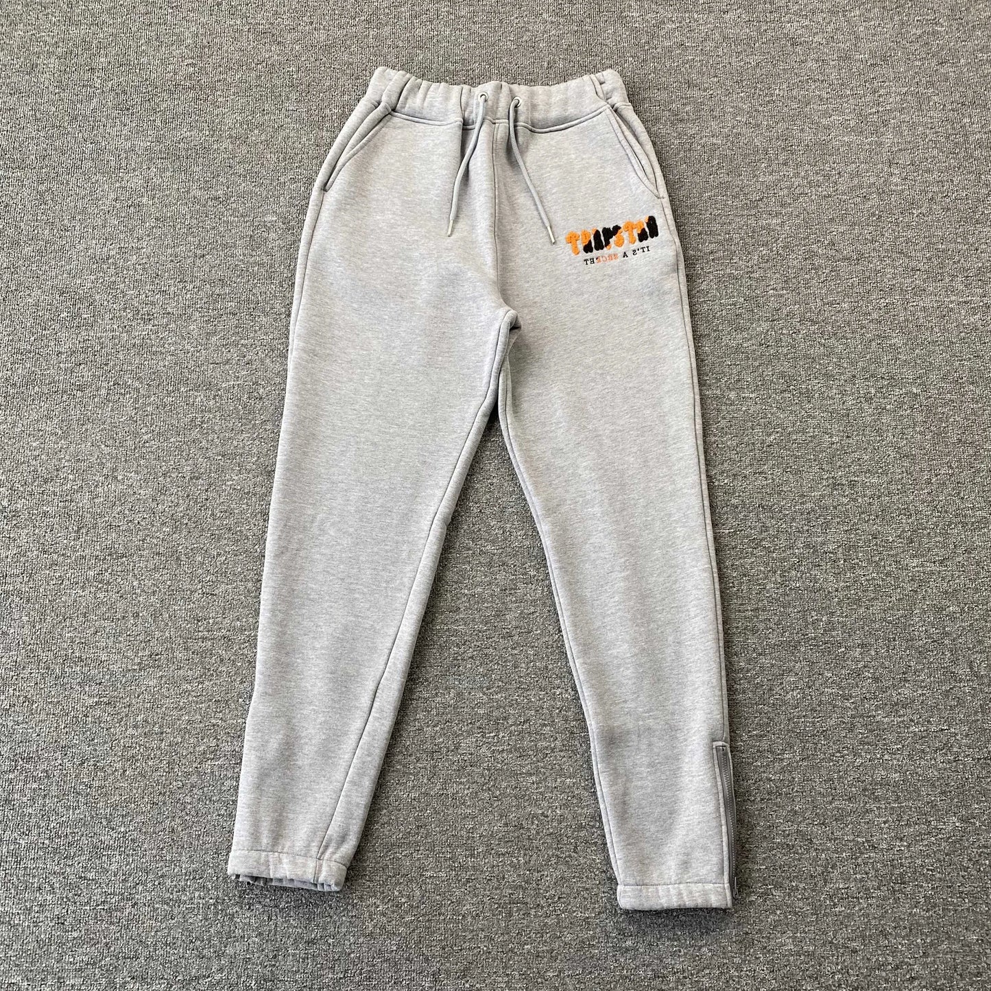 trapstar-chenille-decoded-tracksuit-grey-orange-4-Drip Store Argentina