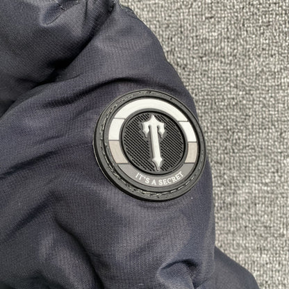 trapstar-decoded-hooded-2_0-puffer-jacket-black-gradient-5-Drip Store Argentina