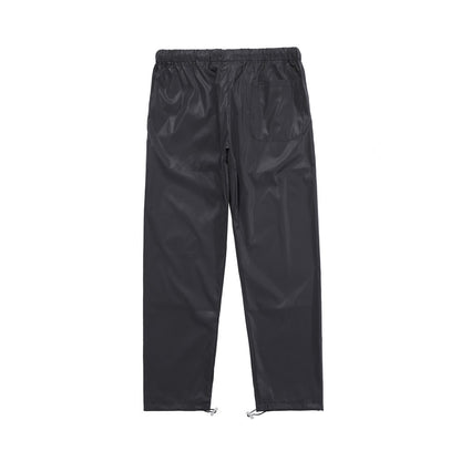 fear-of-god-essentials-track-pants-black-refective-2-Drip Store Argentina