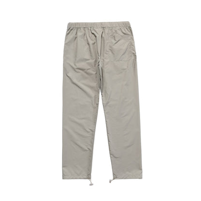 fear-of-god-essentials-track-pants-silver-reflective-4-Drip Store Argentina